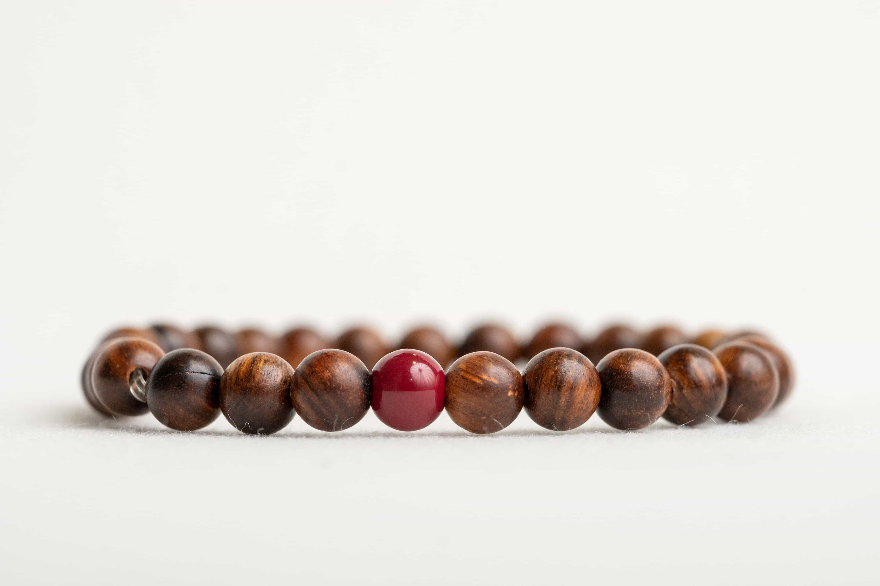 UNLIMITED PROSPERITY: Agarwood Beads Bracelet with Southern Red Agate Center Stone