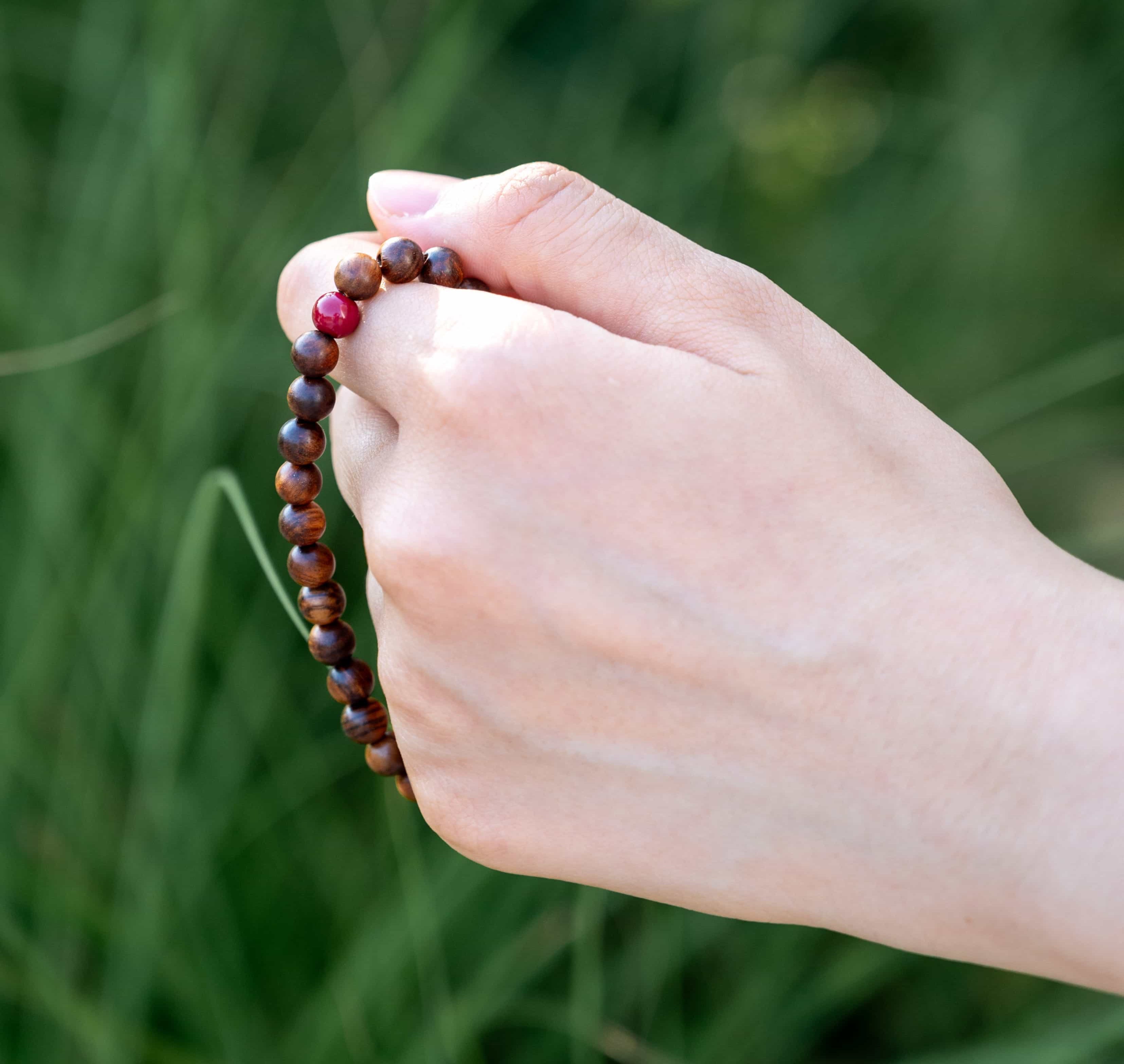 UNLIMITED PROSPERITY: Agarwood Beads Bracelet with Southern Red Agate Center Stone