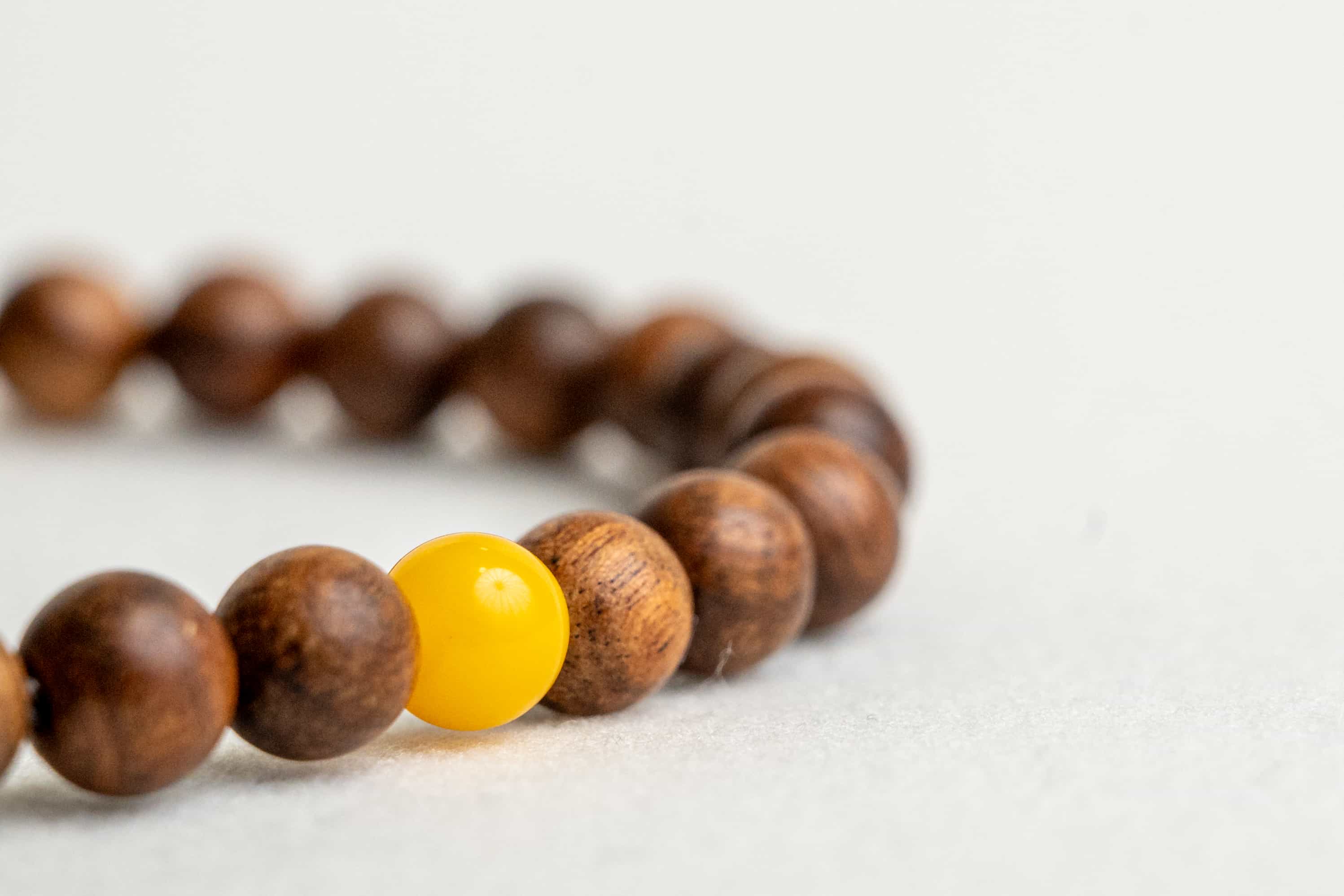 INNER STRENGTH: Agarwood Beads Bracelet with Honey Yellow Amber Center Stone