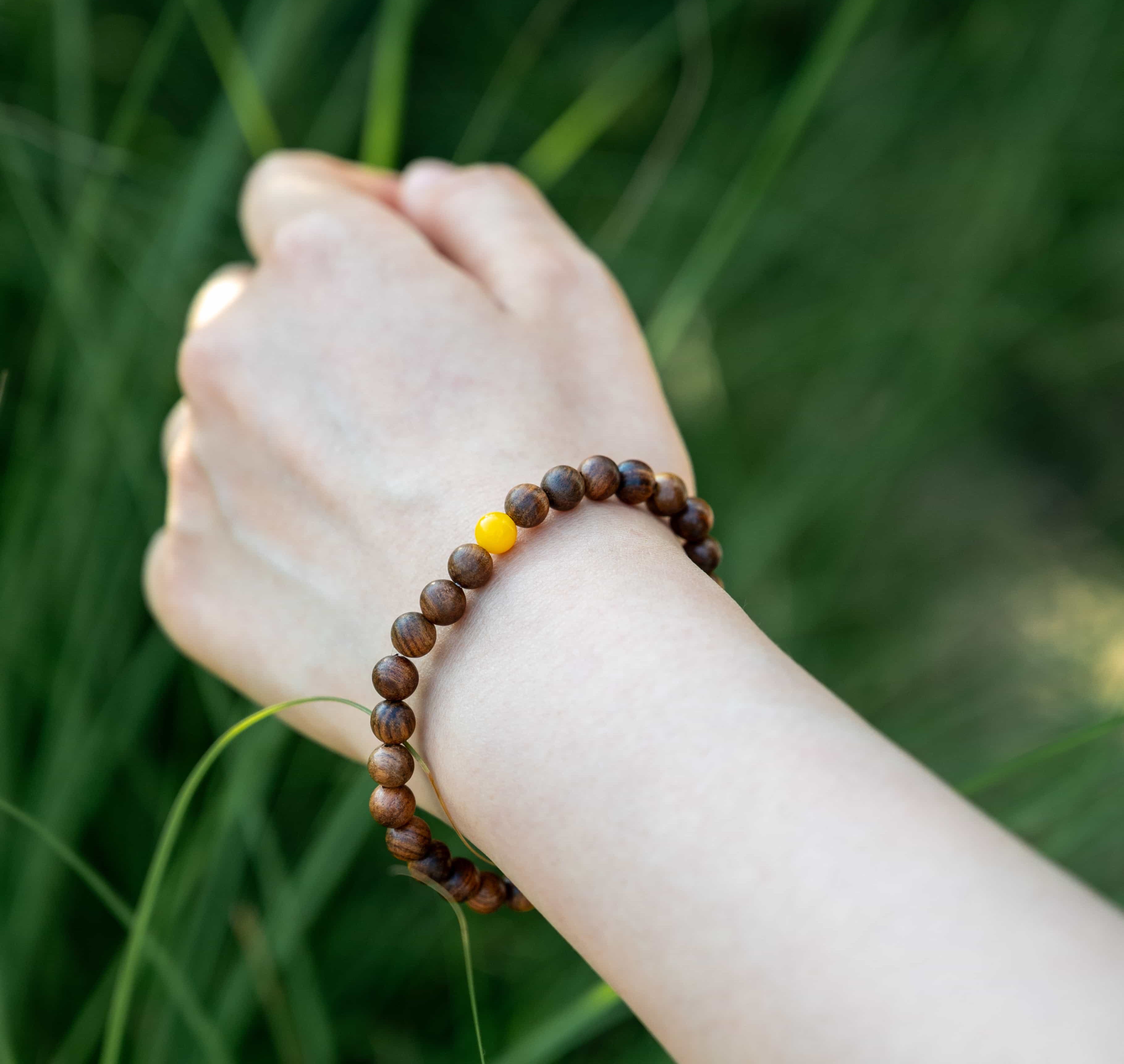 INNER STRENGTH: Agarwood Beads Bracelet with Honey Yellow Amber Center Stone