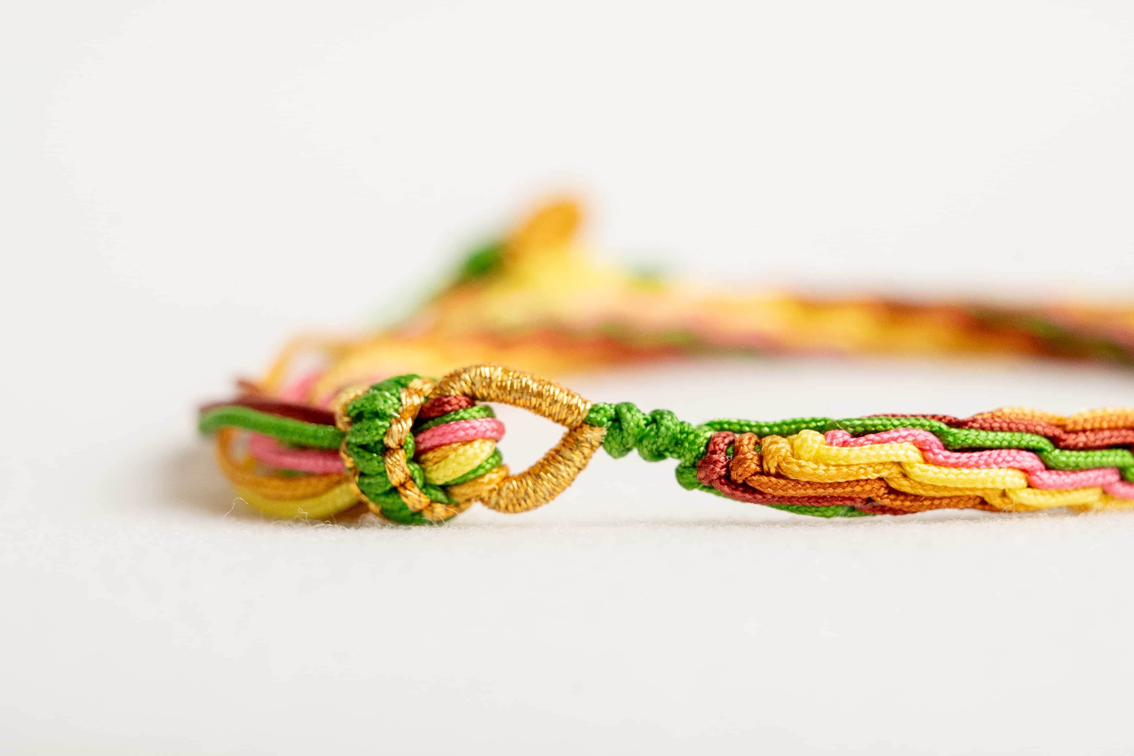 "MAJOR HEAT": Green, Yellow & Brown Handmade Braided Bracelet for Passion