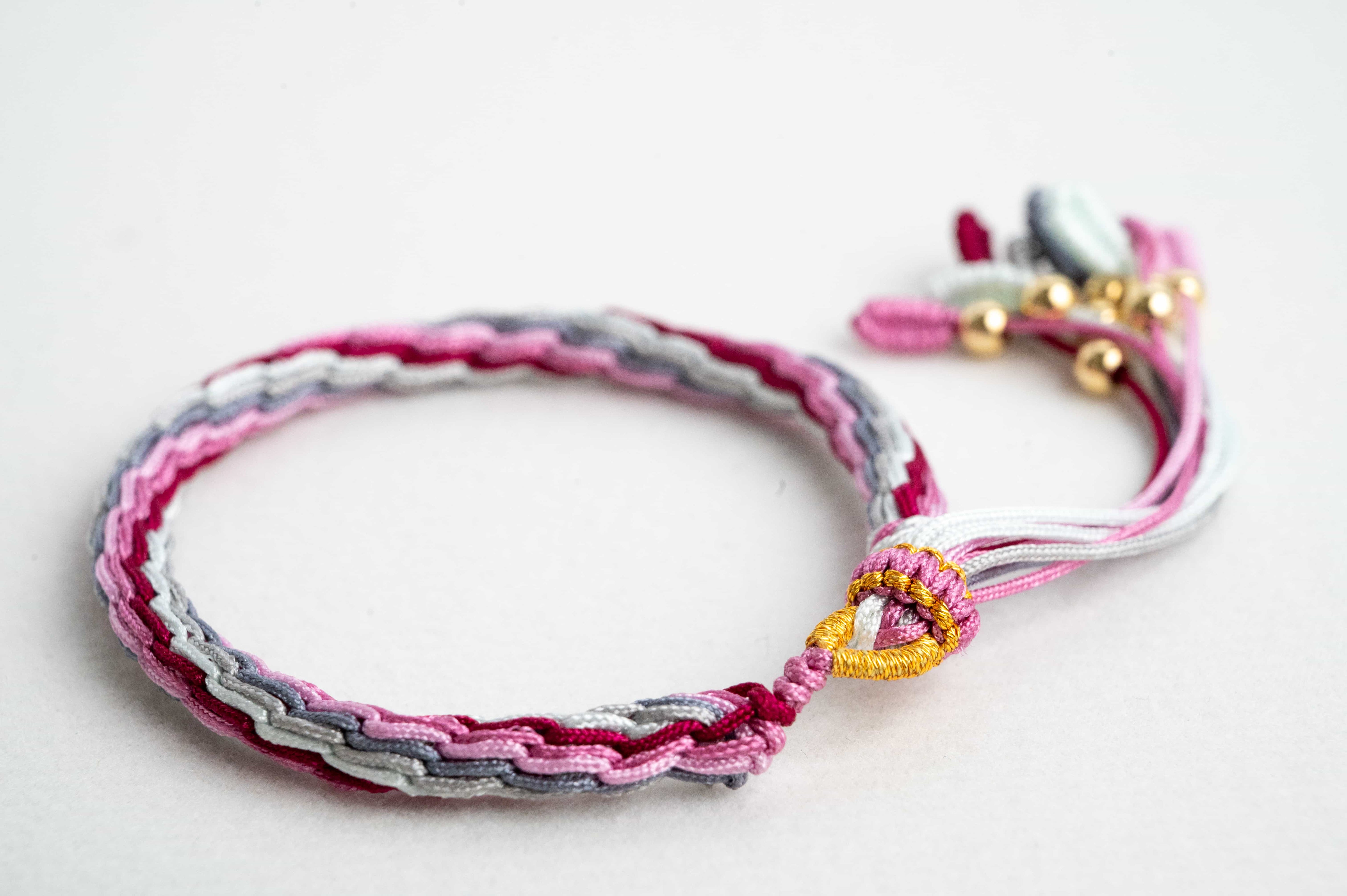 "AWAKENING OF INSECTS": Pink and Grey Handmade Braided Bracelet for Rejuvenation