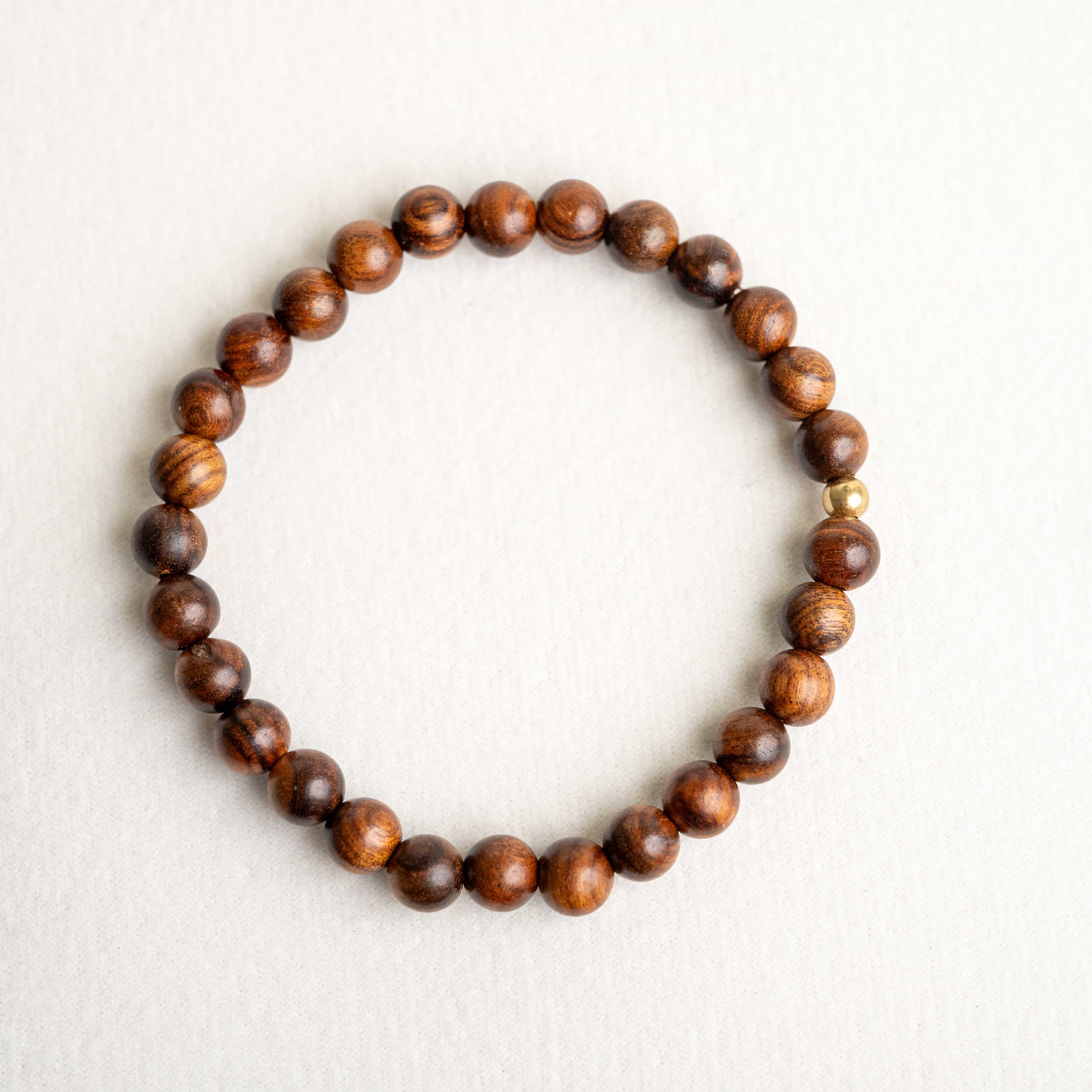 ROYAL CONFIDENCE: Agarwood Beads Bracelet with Gold Center Stone