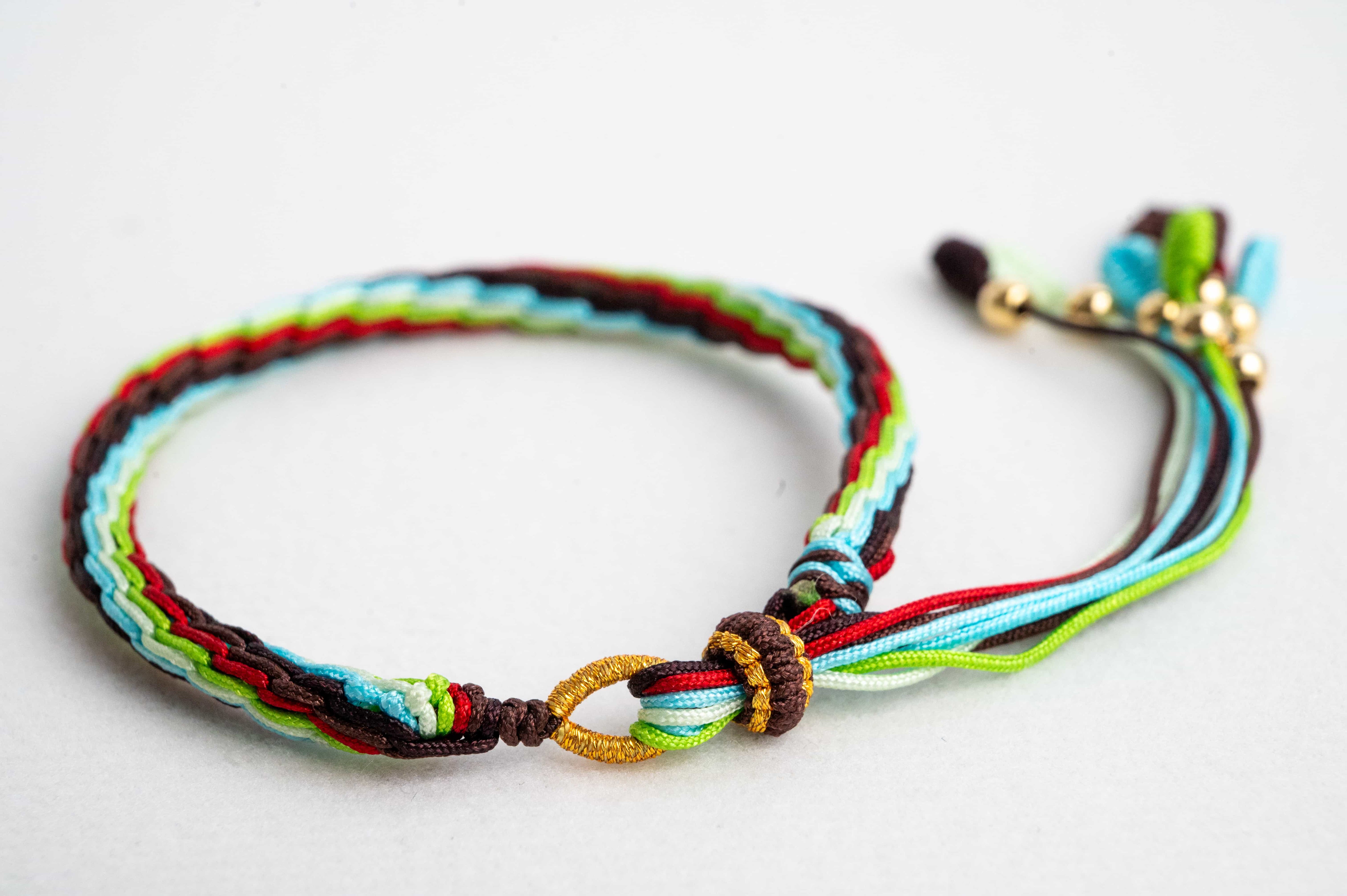 "GRAIN IN EAR": Red, Green and Light Blue Handmade Braided Bracelet for Vitality