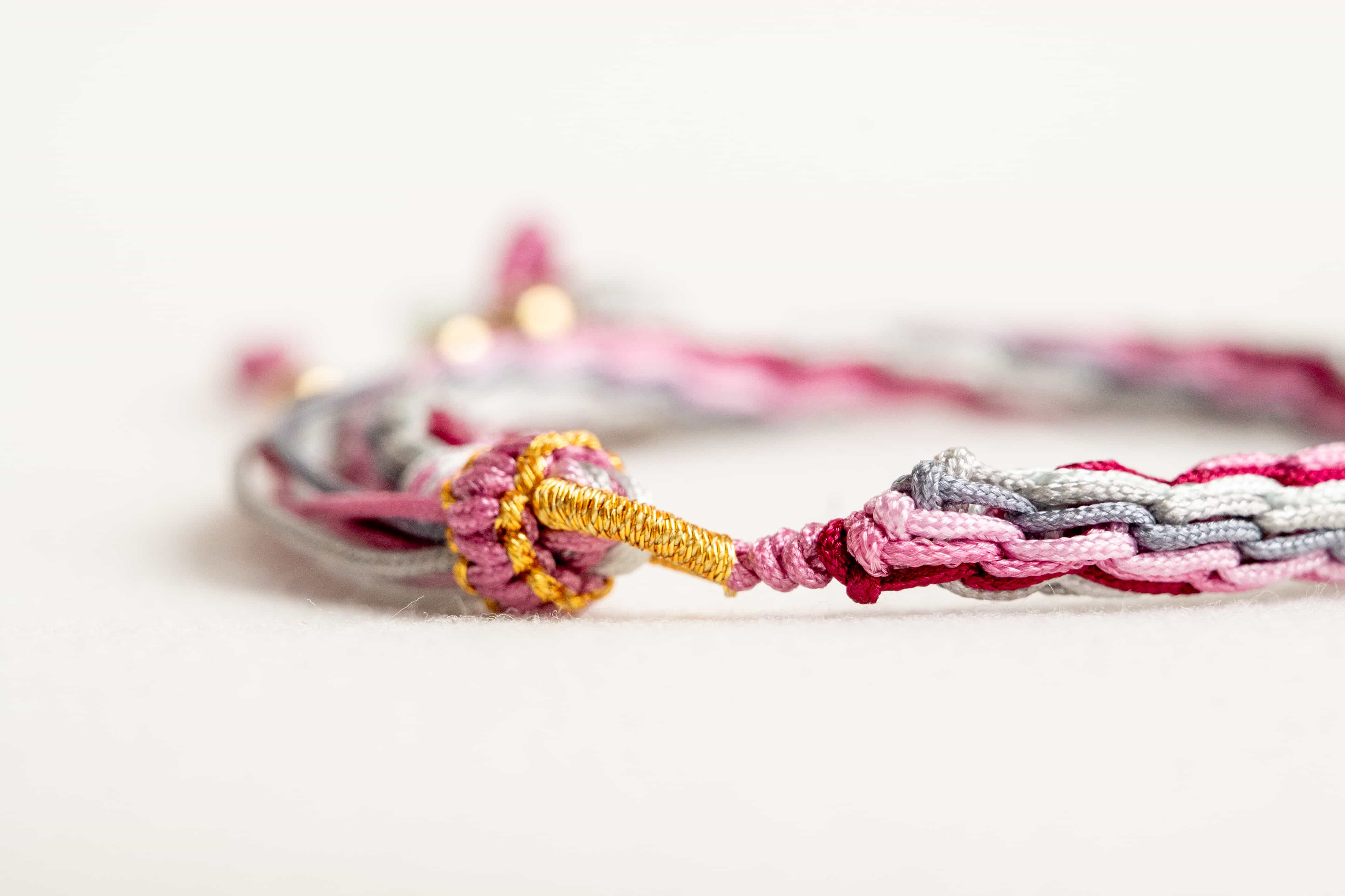 "AWAKENING OF INSECTS": Pink and Grey Handmade Braided Bracelet for Rejuvenation