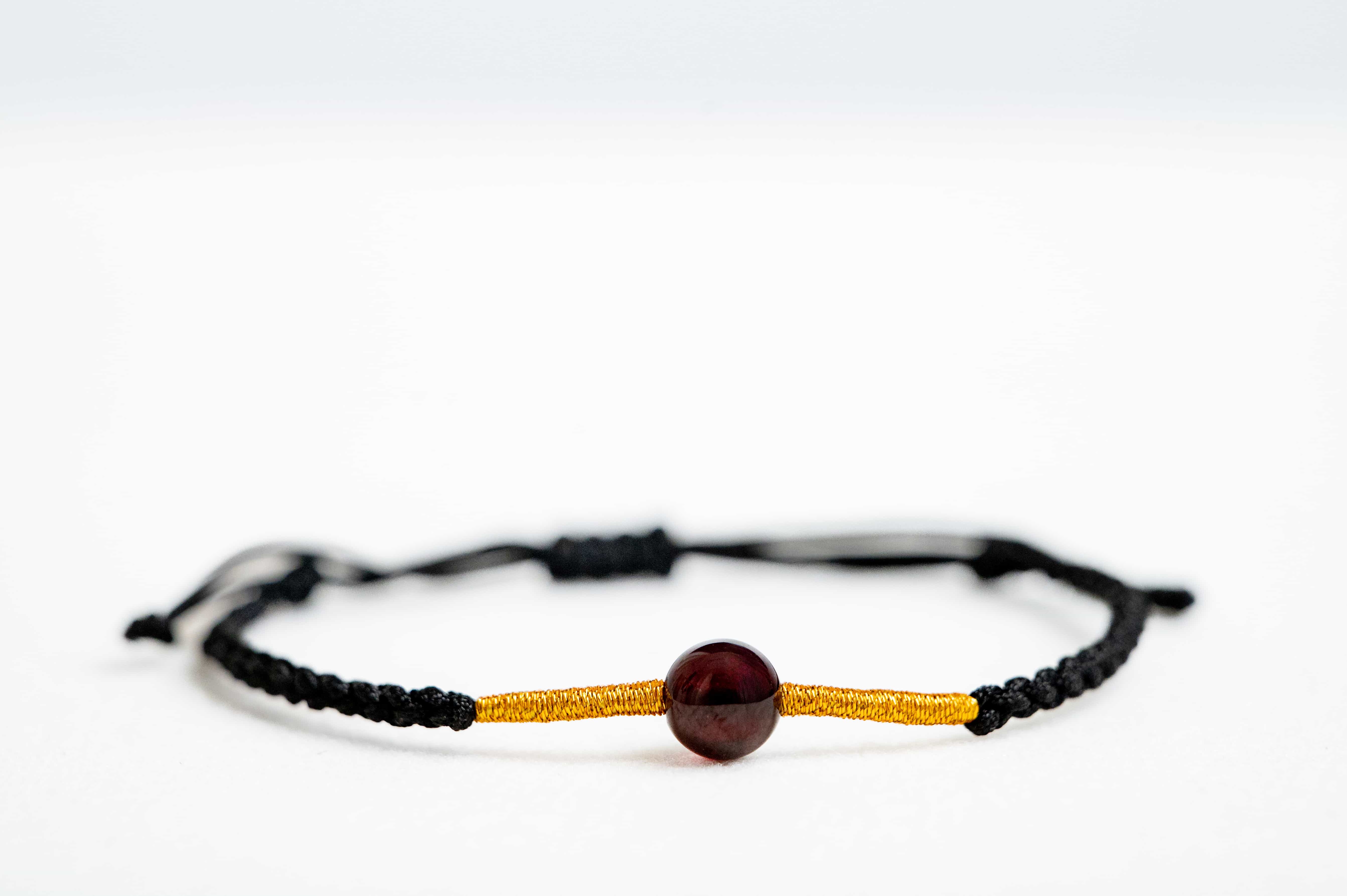 FIRE: Garnet Bead Black & Gold Braided Bracelet