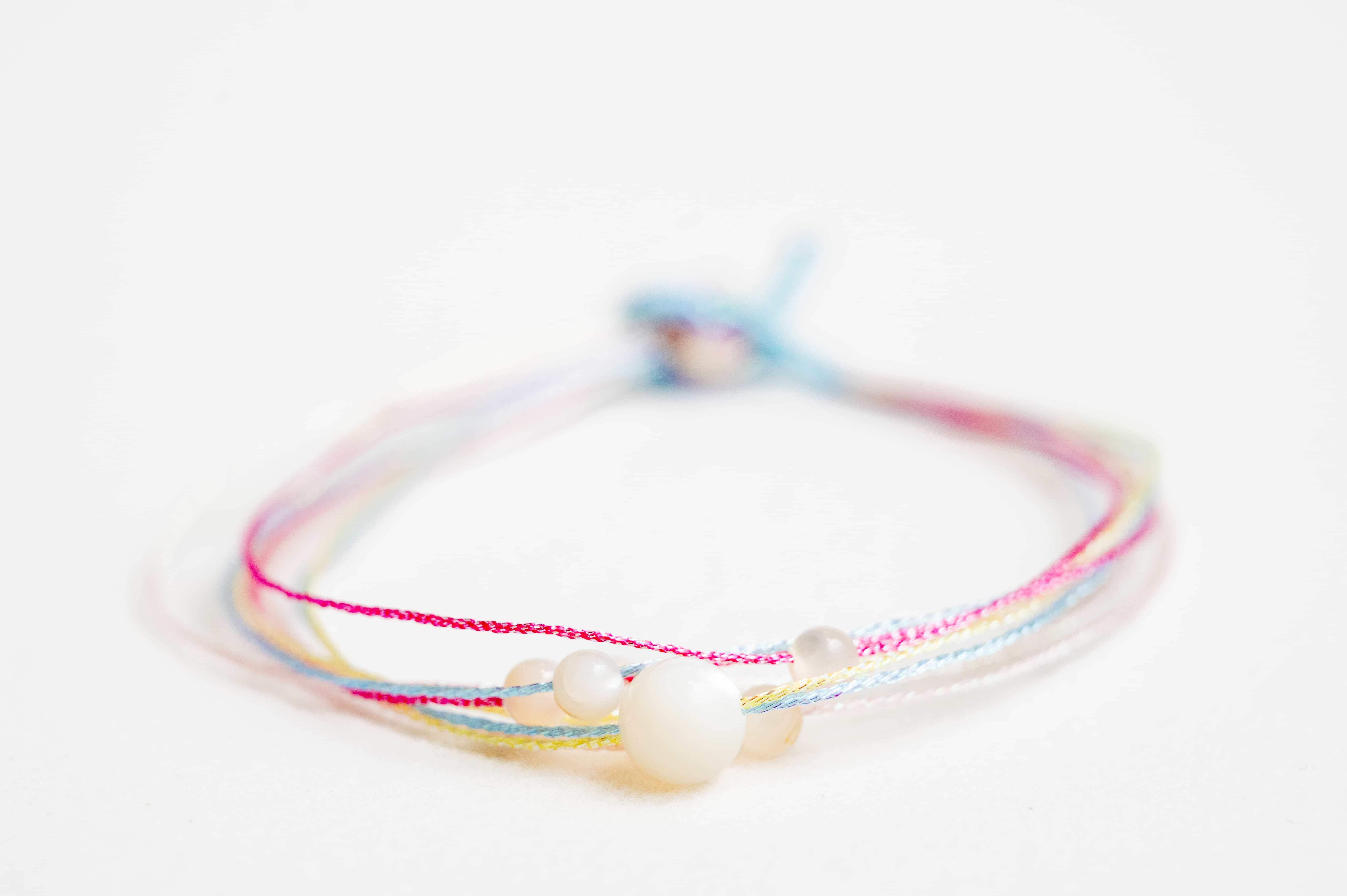 WATER: White Shell Bead Rainbow Braided Bracelet