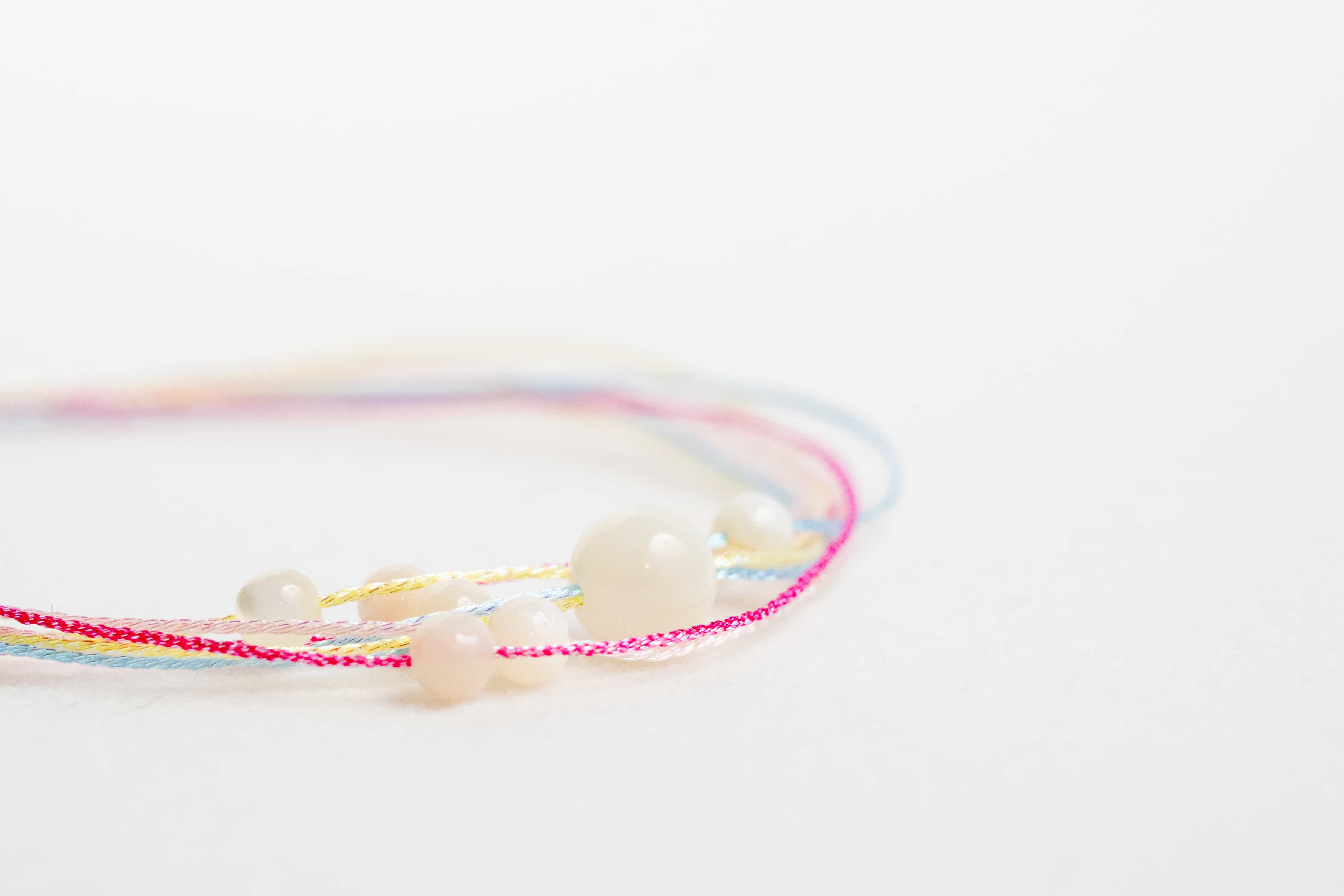 WATER: White Shell Bead Rainbow Braided Bracelet