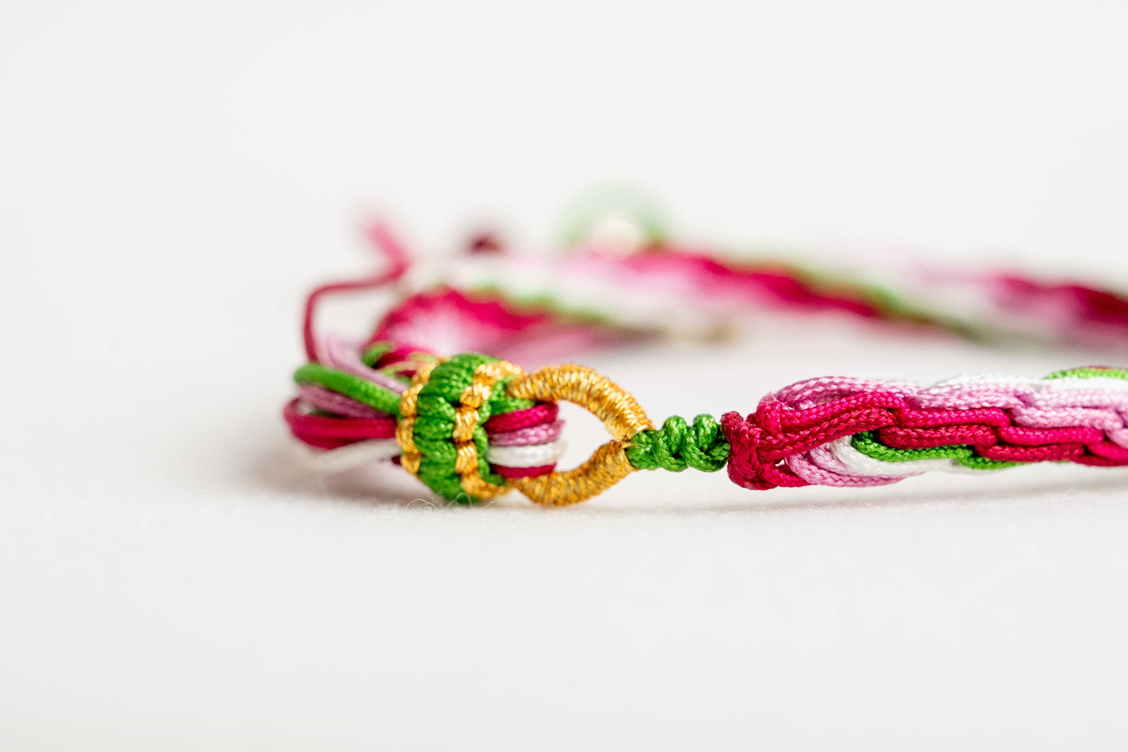 "GRAIN RAIN": Pink and Red Handmade Braided Bracelet for Growth