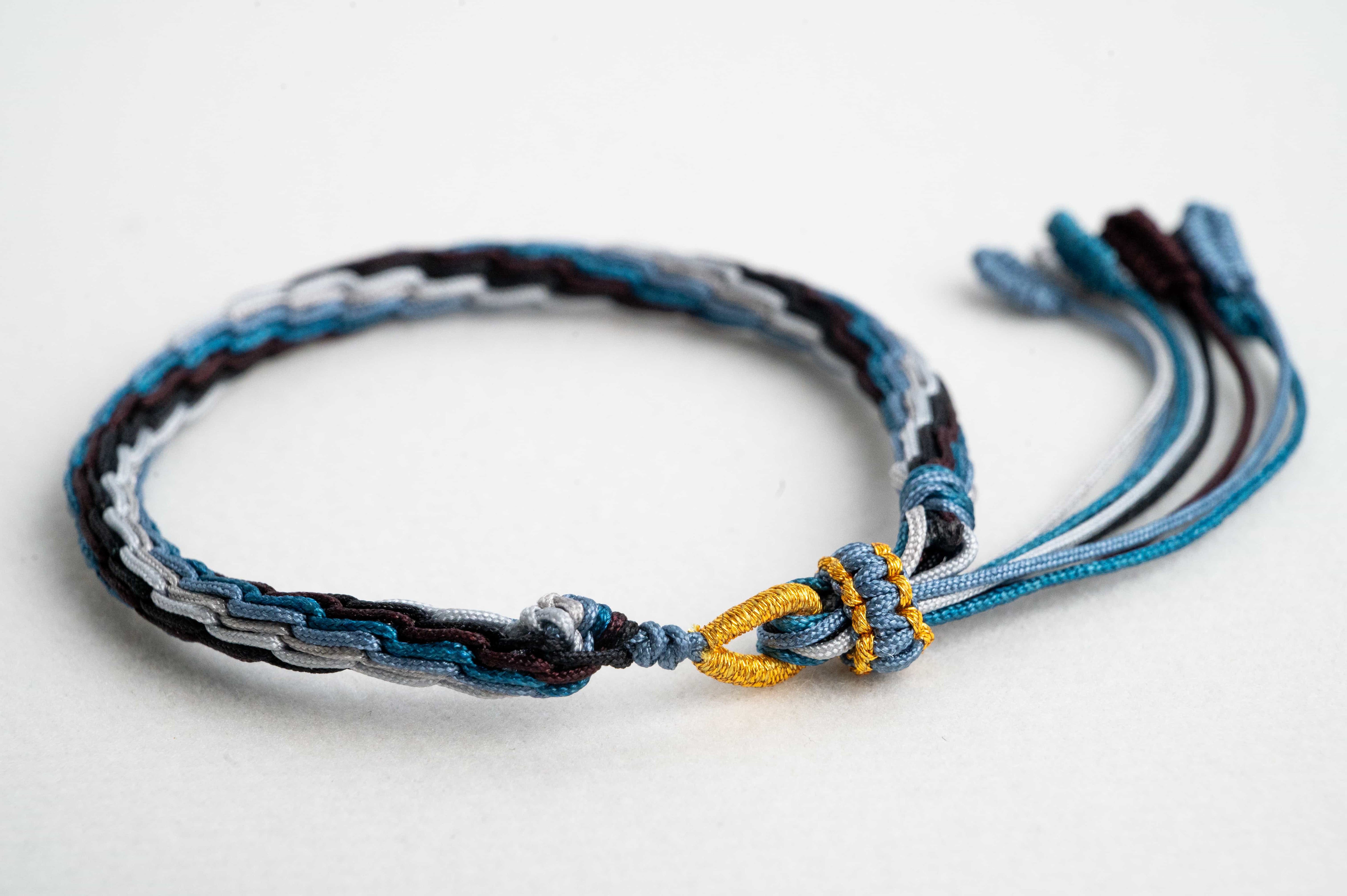 “MINOR COLD": Blue & White Handmade Braided Bracelet for Patience