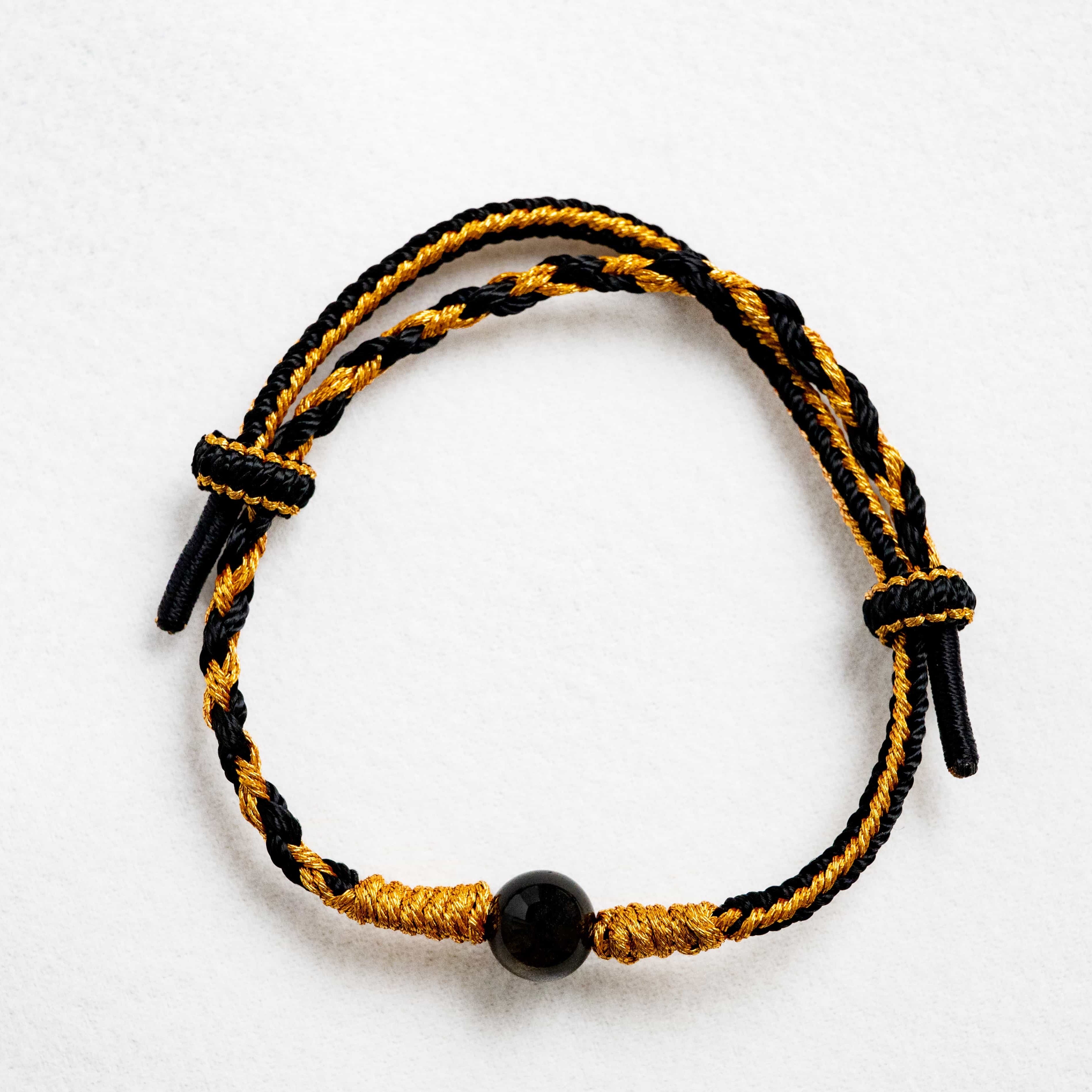 FIRE: Obsidian Bead Black & Gold Braided Bracelet