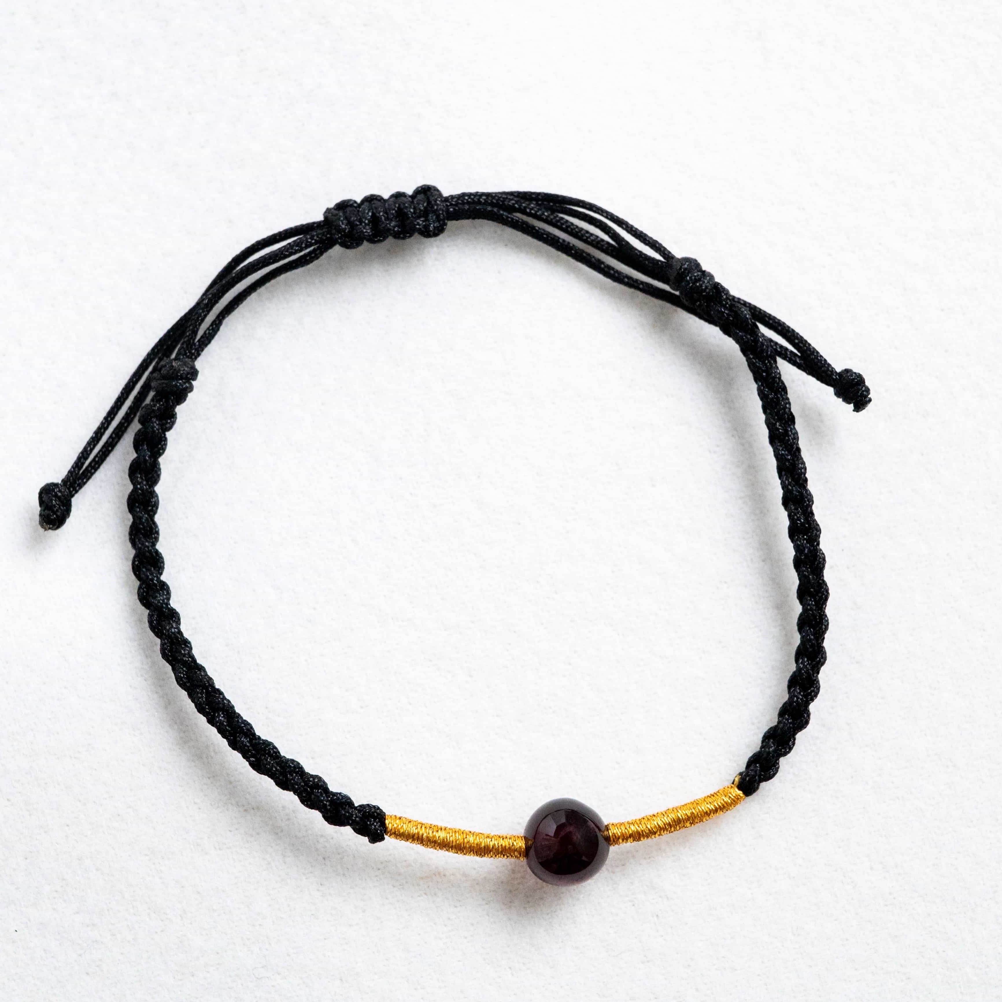 FIRE: Garnet Bead Black & Gold Braided Bracelet