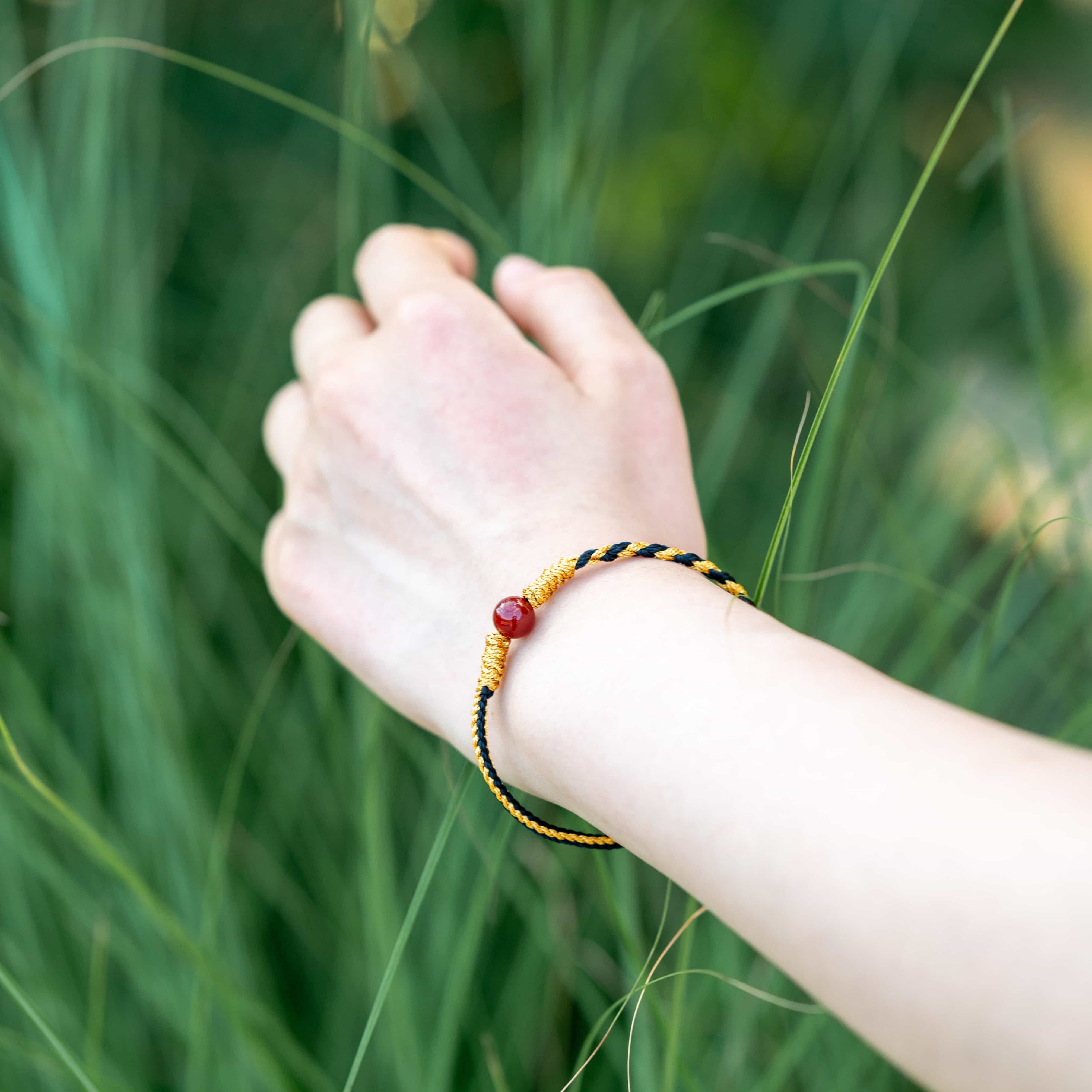 EARTH: South Red Agate Bead Black & Gold Braided Bracelet