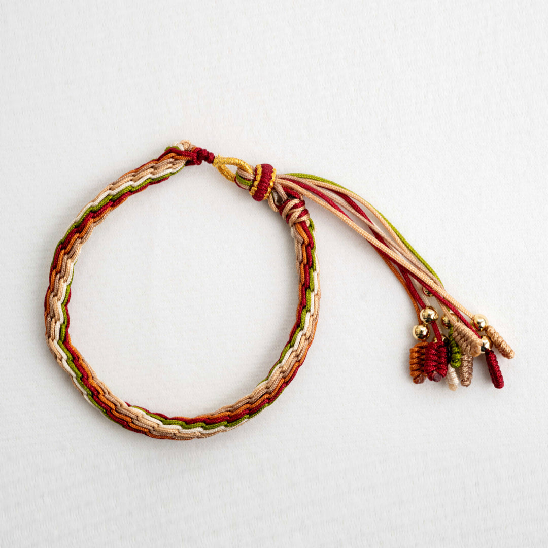 "MAJOR SNOW": Red & Yellow Handmade Braided Bracelet for Healing