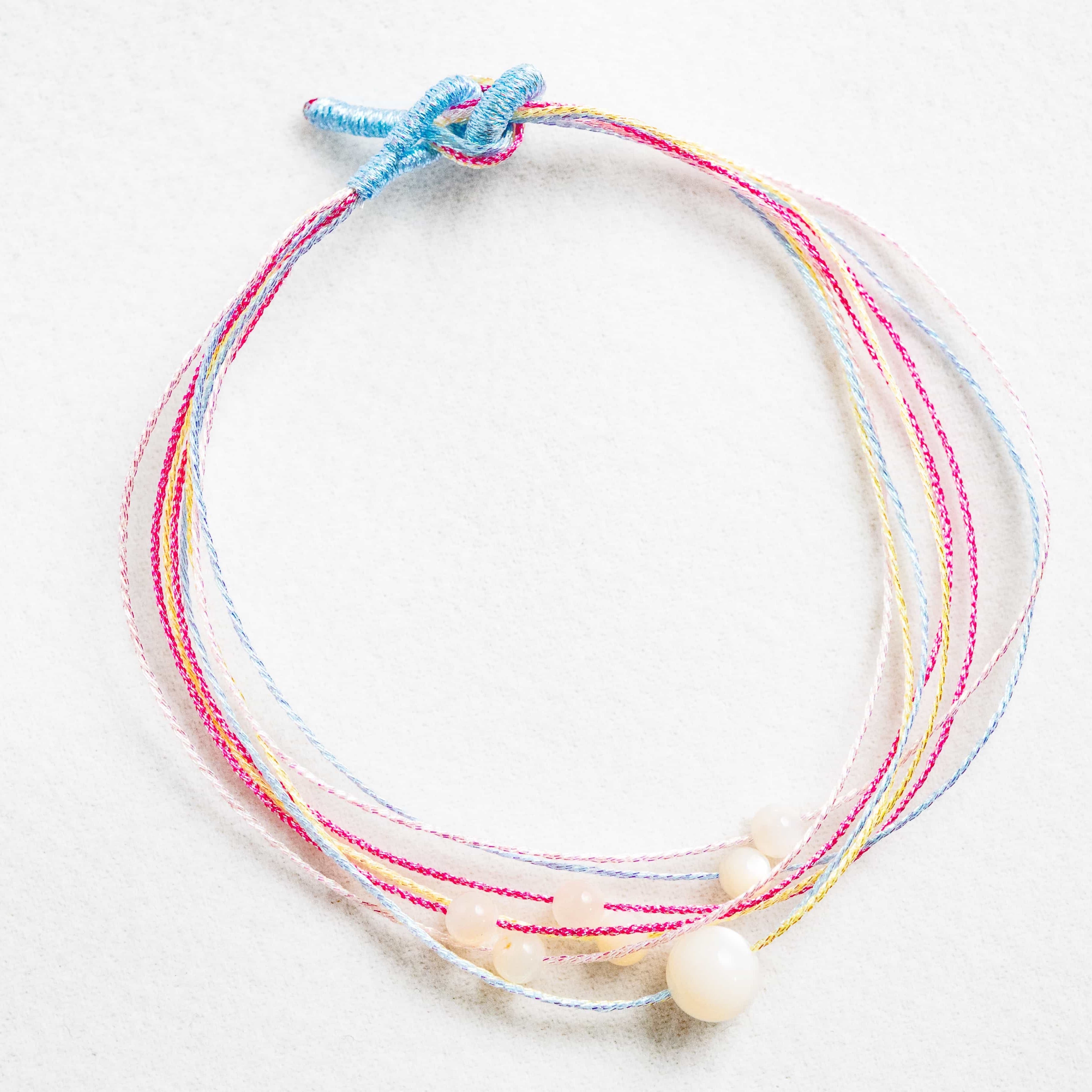 WATER: White Shell Bead Rainbow Braided Bracelet