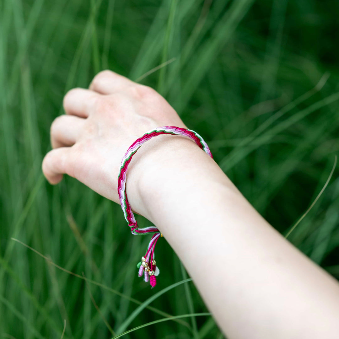 "GRAIN RAIN": Pink and Red Handmade Braided Bracelet for Growth