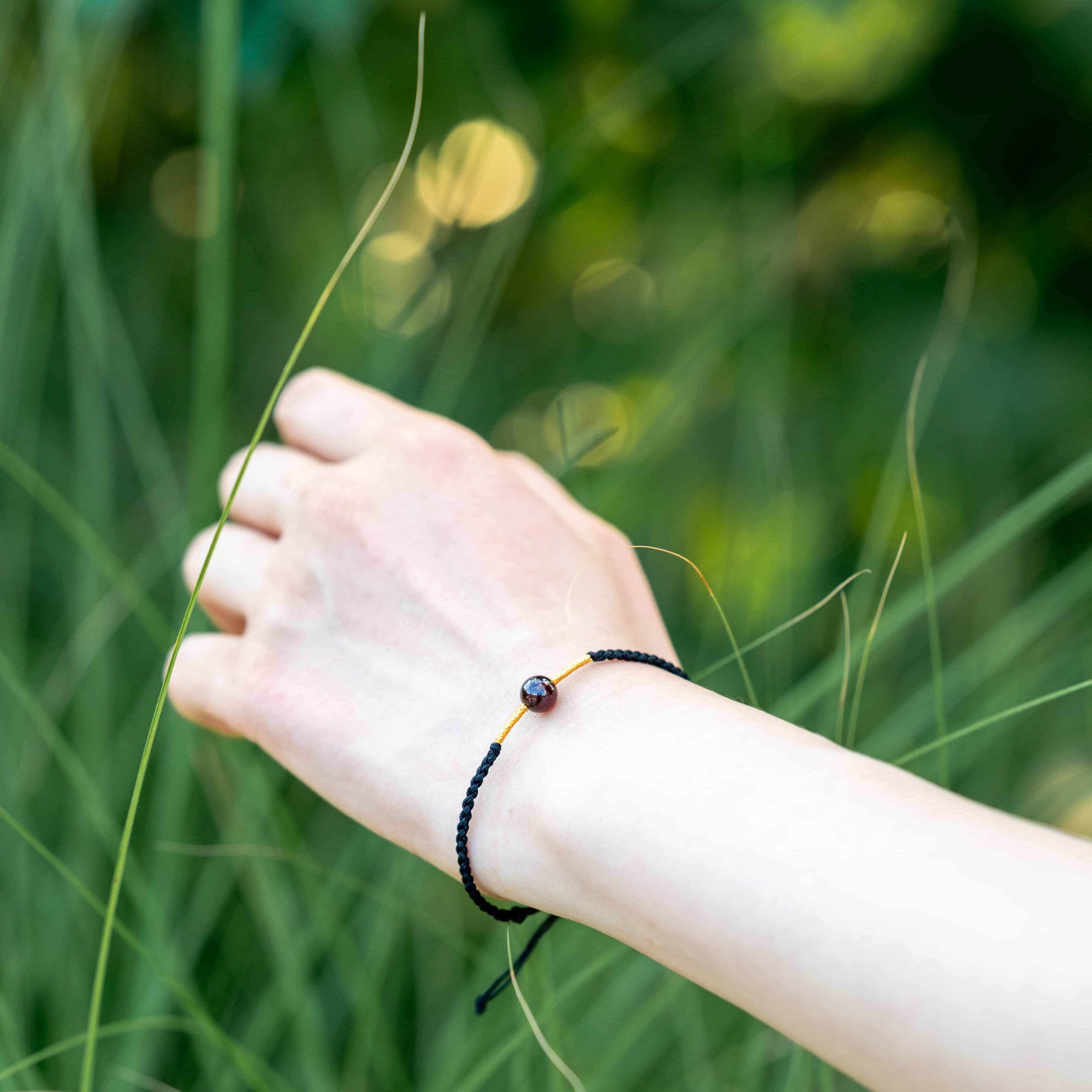 FIRE: Garnet Bead Black & Gold Braided Bracelet